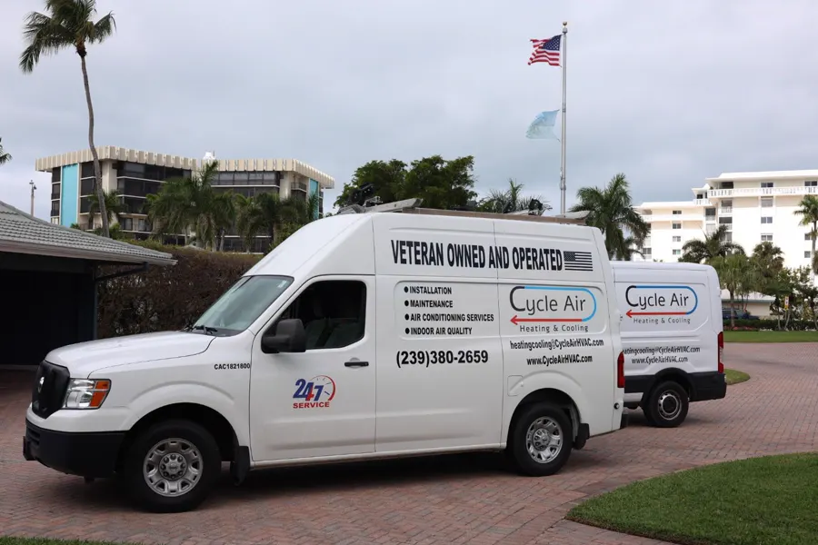 A Cycle Air Heating and Cooling service van parked in front of a Southwest Florida building